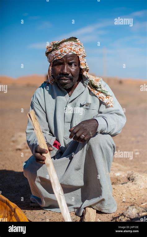 Portrait Of Moroccan Man In Traditional Clothes For This Region At