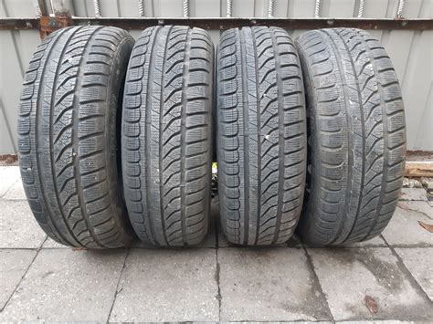 Всесезонные шины DUNLOP 185/60/R15 на дисках Skoda R15, 5/100