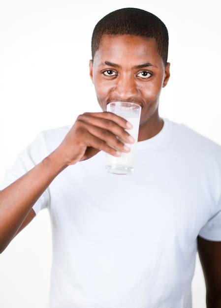 Premium Photo Man Drinking A Glass Of Milk