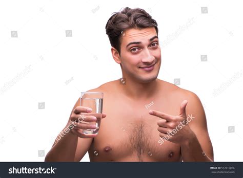 Стоковая фотография Naked Man Drinking Water Isolated On Shutterstock
