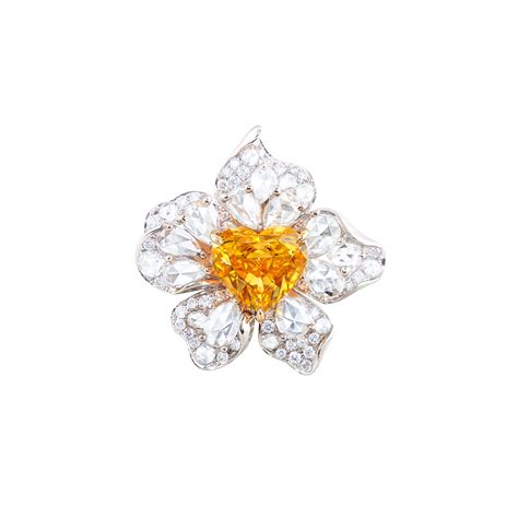 Fancy Vivid Yellow Orange Colored Diamond And Diamond