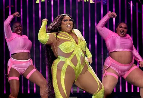 Lizzo Wears Neon Bedazzled Catsuit on Special Tour | POPSUGAR Fashion UK