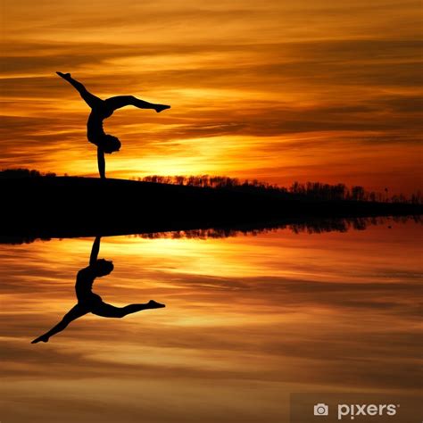 Poster Silhouette Of Female Gymnast Doing A Handstand In Sunset Pixers Us