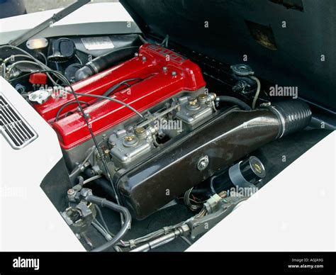 Lotus Twin Cam Engine With Red Cylinder Head In The Engine Compartment