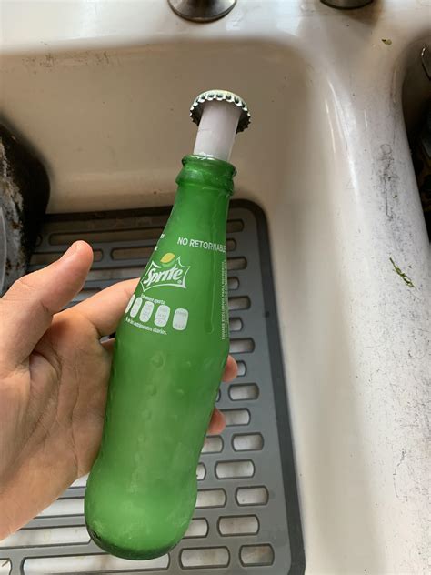 The way this soda bottle popped open in the freezer : r/mildlyinteresting