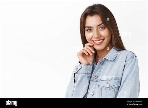 Feminine Tender And Beautiful Brunette Woman In Denim Jacket Touching Lip Silly And Sensual
