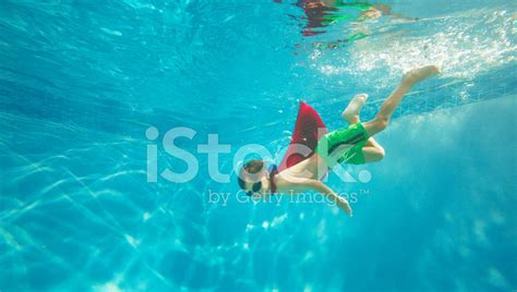 Boy Swimming Underwater stock photos - FreeImages.com