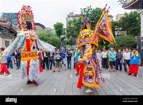 A religious parade during the Bao Sheng Cultural Festival that ...