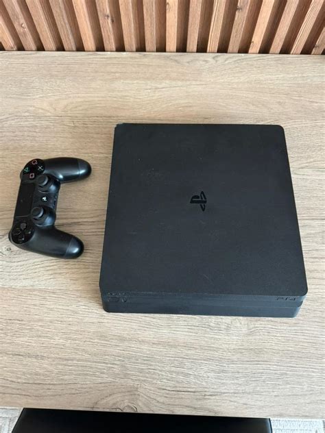 Ps 4 slim 500 gb 1 adet orjinal kol 1 adet çakma kol ile Oyun ve Oyun