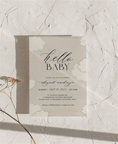 A Baby Shower Is Shown With The Word Hello Baby In Black On It S Card