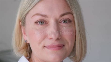 Portrait Of A Beautiful Year Old Blonde Of European Appearance Laughing At The Camera Stock