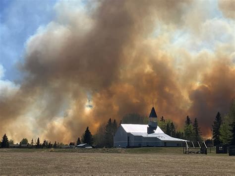 Provincial state of emergency declared in Alberta as wildfires spread and more residents flee ...