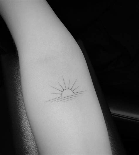 Elegant sunrise tattoo by jakub nowicz - Tattoogrid.net