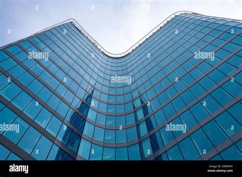 An upward look towards steel and glass facade of "Filadelfie" high-rise ...