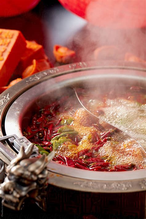 Traditional Chinese Sichuan Spicy Hot Pot Closeup Boiling Soup By Stocksy Contributor