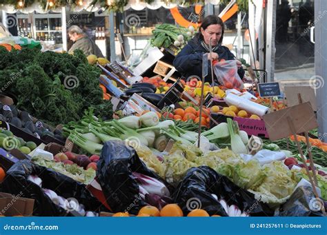 Consumers Buy From A Vegetable Vendor In A Market In Cainta Rizal