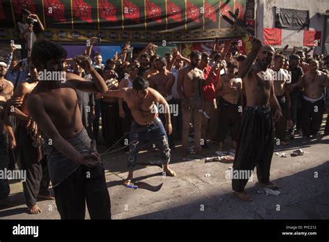 Shiite Muslims Perform Shia Cutting Flagellation Tatbir During