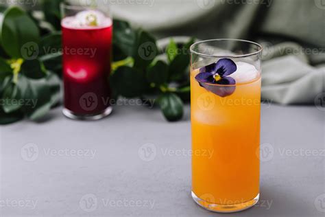 Elegant cocktail with edible flower garnish 45604780 Stock Photo at