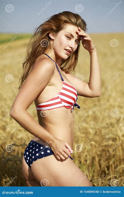 Woman In American Flag Bikini In A Wheat Field Stock Photo Image Of