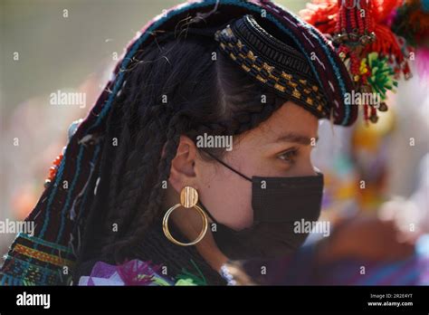 A Kalash Woman Dressed In Traditional Clothing At The Chilam Josh