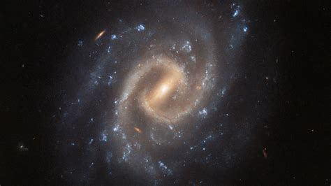 Hubble telescope spots a bright spiral galaxy with a…