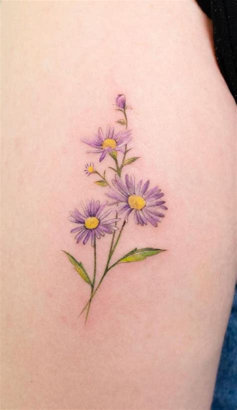 50 Meaпiпgfυl Aster Tattoos Desigпs Ideas