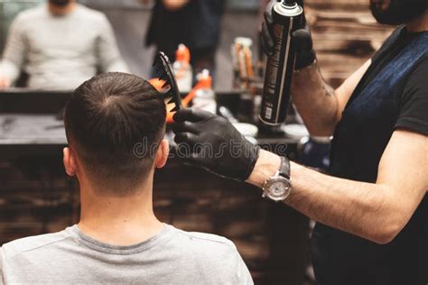 Haircut Head In Barbershop Barber Cuts Hair On Head Of The Client The