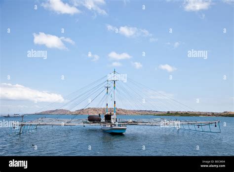 Traditional fishing boat in Indonesia Stock Photo - Alamy