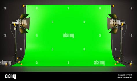 Green screen background TV studio with spotlights on stands for a movie ...