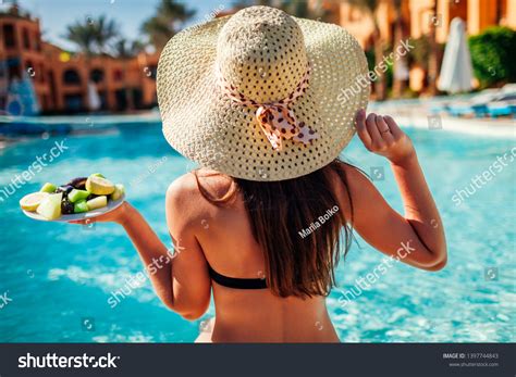 Woman Bikini Eating Fruits Relaxing Swimming Stock Photo 1397744843 Shutterstock