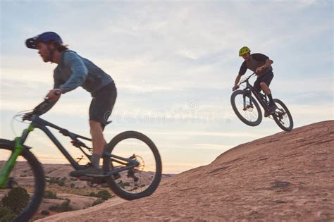 Perfecting The Art Of Biking A Young Man Out Mountain Biking During