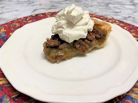 Bourbon Pecan Pie with Whipped Cream - Country at Heart Recipes