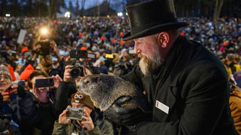 Punxsutawney Phil Predicts Early Spring After Waking Up To Not See His