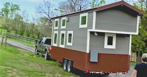 A couple buys a tiny house and parks it right outside their home to put ...