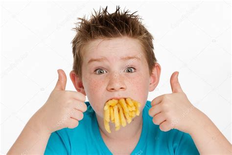 Boy Eating French Fries Stock Photo Slp London