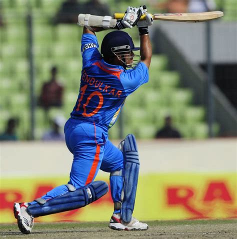 Sachin Tendulkar drives during his 100th century | ESPNcricinfo.com