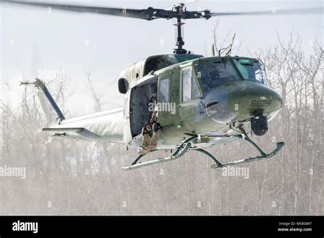 A 54th Helicopter Squadron Uh 1n Iroquois Hovers Over The Turtle