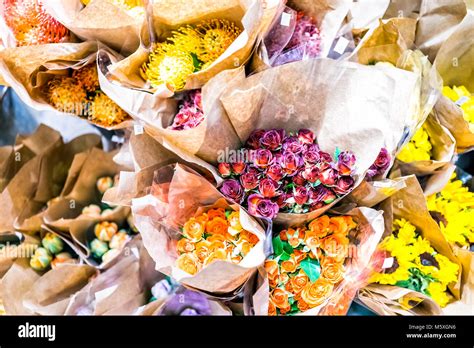 Colorful Bouquets With Many Yellow Sunflowers In Flower Store Hi Res