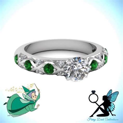 The Fairy Tinkerbell Engagement Ring Has Green Stones On It