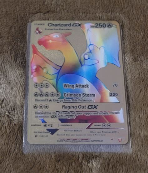 Mavin Pokemon Gold Metal Card Rainbow Stage 2 Charizard GX HP 250