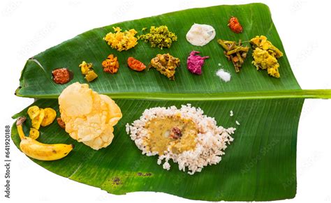 Onam Sadhya Thali on Banana Leaf - Traditional Kerala Vegetarian Feast Stock Photo | Adobe Stock