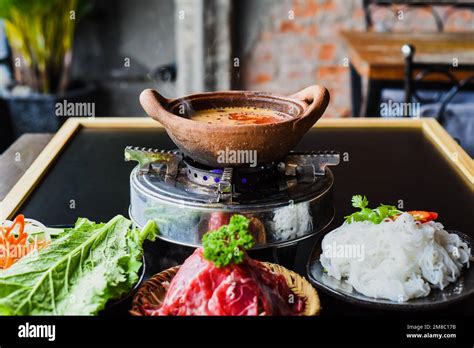 Korean Spicy Hot Pot With Beef Meat And Noodles On Black Background Stock Photo Alamy