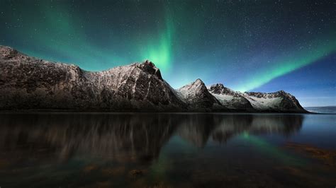 Landscape View Of Snow Covered Mountain Aurora Borealis Starry Sky