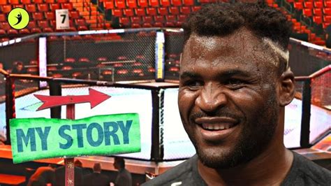 a man standing in front of an arena with a sign that says my story on it