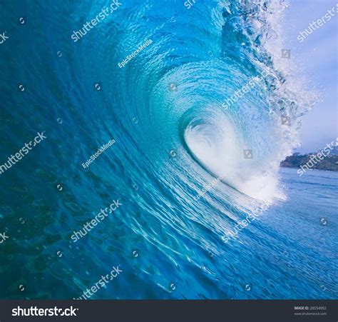 Large Blue Surfing Wave Breaks Ocean Stock Photo (Edit Now) 28554992