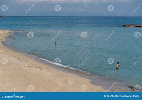 Tourist People Enjoying The Sandy Beach Relaxing Sunbathe Swimming In