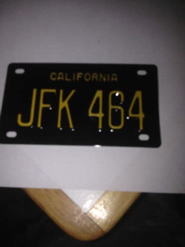 JFK 464 4" California License Plate -- Antique Price Guide Details Page