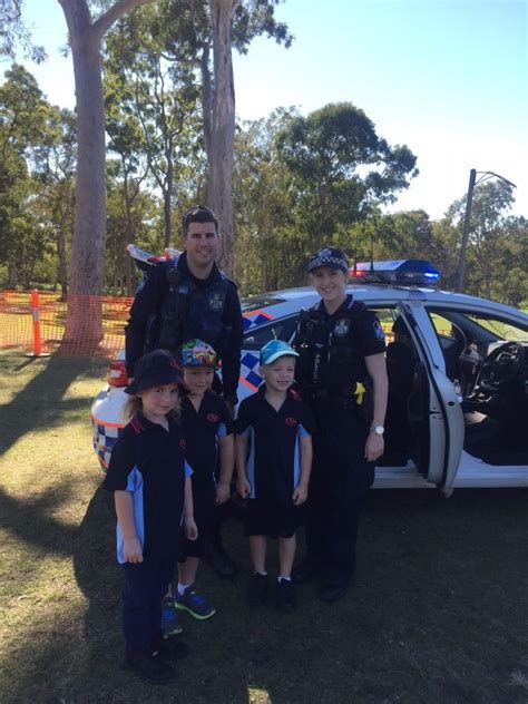 Police help Camira State School students walk to school safely - Ipswich