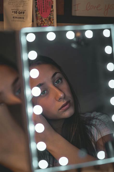 Woman in Front of Vanity Mirror · Free Stock Photo