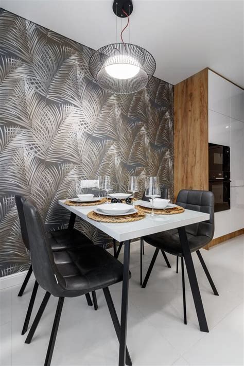 Modern Cuisine in Black in the Dining Table and Kitchen Appliances ...